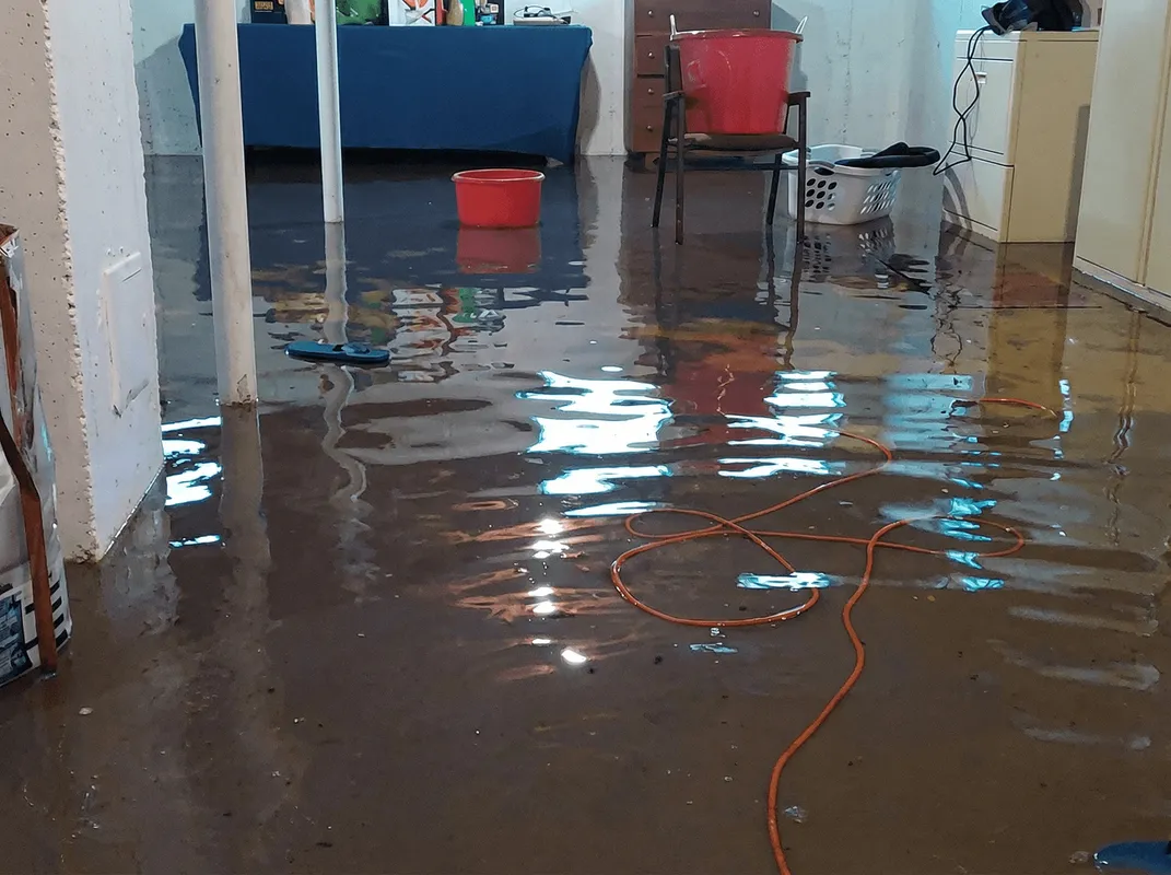 Basement with boiler, cabinets and washing machine completely flooded in Gilbert, AZ